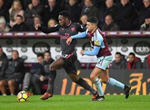 Images Dated 26th November 2017: Intense Rivalry: Welbeck vs. Lowton in the Burnley vs. Arsenal Premier League Clash
