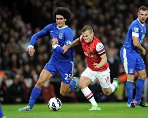 Images Dated 16th April 2013: Intense Rivalry: Wilshere vs. Fallaini Clash in Arsenal vs. Everton Premier League Match