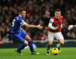 Everton Prints: Intense Rivalry: Wilshere vs. McCarthy - Arsenal's Battle Against Everton (2013-14)