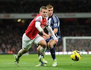 Images Dated 8th December 2012: Intense Rivalry: Wilshere vs. Morrison Clash at the Emirates, 2012-13 Premier League