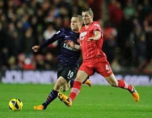 Images Dated 1st January 2013: Intense Rivalry: Wilshere vs Schneiderlin - Southampton vs Arsenal Clash (2013)