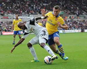 Swansea Prints: Intense Rivalry: Wilshere vs. Tiendalli - The Battle at Swansea's Liberty Stadium