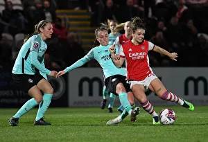 Arsenal Women V Brighton And Hove Albion Women 2021-22 Prints: Intense Shooting Duel: Arsenal Women vs Brighton Hove Albion Women in FA WSL