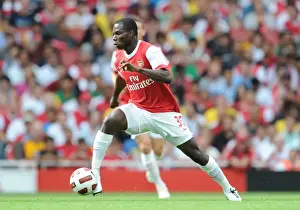 Arsenal V AC Milan 2010-11 Prints: Intense Showdown: Arsenal's Emmanuel Frimpong vs AC Milan in the Emirates Cup