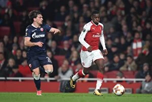Arsenal v Red Star Belgrade 2017-18 Collection: Intense Showdown: Nketiah vs. Stocjkovic in Arsenal's Europa League Battle
