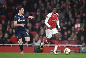 Arsenal V Red Star Belgrade 2017-18 Prints: Intense Showdown: Nketiah vs. Stocjkovic in Arsenal's Europa League Battle