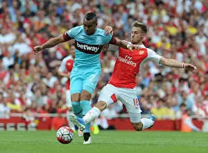 Arsenal V West Ham United 2015-16 Prints: Intense Tackle: Ramsey vs Payet in Arsenal vs West Ham Premier League Clash