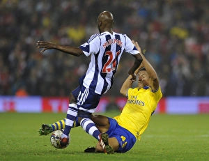 West Bromwich Albion v Arsenal 2013-14 - Capital Cup Collection: Isaac Hayden (Arsenal) Youssouf Mulumbu (WBA). West Bromwich Albion 1: 1 Arsenal. 3