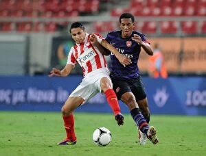 Images Dated 12th September 2012: Isaac Hayden vs. Dimitris Rikspun: Clash of Young Talents in Olympiacos vs. Arsenal NextGen Series