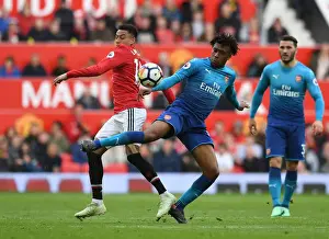Manchester United V Arsenal 2017-18 Prints: Iwobi vs. Lingard: A Premier League Battle at Old Trafford
