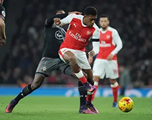 Arsenal V Southampton EFL Cup 2016-17 Prints: Iwobi vs Martina: A Battle in the EFL Cup Quarter-Finals - Arsenal vs Southampton