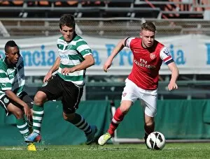 Images Dated 31st March 2013: Jack Jebb (Arsenal) Diego Rubio (Sporting). Arsenal U19 1: 3 Sporting Lisbon U19