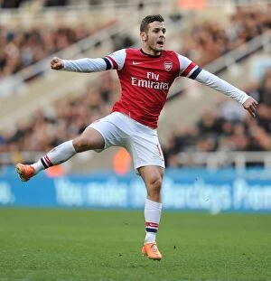 Newcastle United Collection: Jack Wilshere in Action: Arsenal vs. Newcastle United, Premier League (2013-14)
