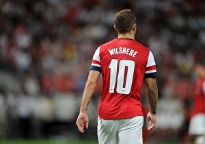 Nagoya Grampus V Arsenal 2013-14 Prints: Jack Wilshere in Action: Arsenal vs Nagoya Grampus, 2013 (Japan)