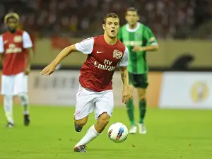 Hangzhou Greentown V Arsenal Prints: Jack Wilshere in Action: Arsenal's Star Midfielder Shines in Pre-Season Friendly against Hangzhou Greentown