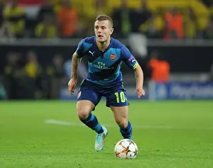 Borussia Dortmund V Arsenal 2014-15 Prints: Jack Wilshere: In Action Against Borussia Dortmund in the 2014-15 UEFA Champions League