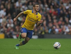 Images Dated 24th August 2013: Jack Wilshere in Action: Fulham vs. Arsenal, Premier League 2013-14