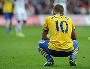 Swansea City v Arsenal 2013-14 Collection: Jack Wilshere: In Action Against Swansea City, Premier League 2013-14