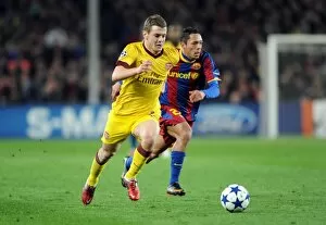 Images Dated 8th March 2011: Jack WIlshere (Arsenal) Adriano (Barcelona). Barcelona 3: 1 Arsenal. UEFA Champions League