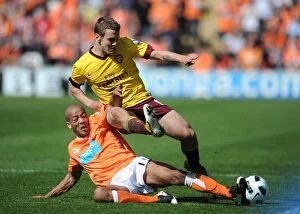 Images Dated 10th April 2011: Jack Wilshere (Arsenal) Alex Baptiste (Blackpool). Blackpool 1: 3 Arsenal