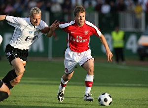Szombathely v Arsenal 2008-09 Collection: Jack Wilshere (Arsenal) Andras Kaj (Szombathely)