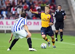 Jack Wilshere (Arsenal) Andy Holdsworth (Huddersfield)