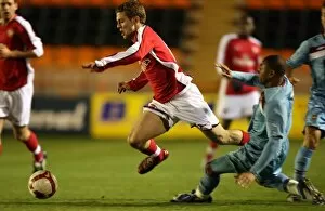 Images Dated 9th March 2009: Jack Wilshere (Arsenal) Ashley Miller (West Ham)