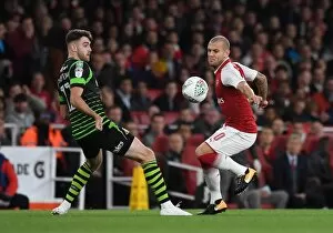 Arsenal v Doncaster Rovers - Carabao Cup 2017-18 Collection: Jack Wilshere (Arsenal) Ben Whiteman (Doncaster). Arsenal 1: 0 Doncaster. The Carabao Cup