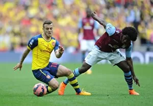 Jack Wilshere (Arsenal) Carlos Sanchez (Villa). Arsenal 4: 0 Aston Villa. FA Cup Final