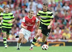 Jack Wilshere (Arsenal) Charlie Mulgrew (Celtic). Arsenal 3: 2 Celtic. Emirates Cup