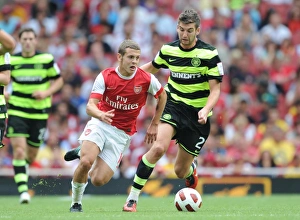 Arsenal v Celtic 2010-11 Collection: Jack Wilshere (Arsenal) Charlie Mulgrew (Celtic). Arsenal 3: 2 Celtic. Emirates Cup