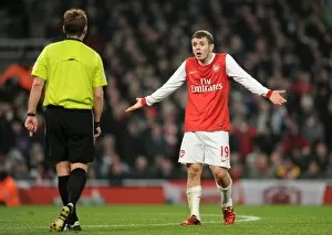 Jack Wilshere (Arsenal) chats to the referee. Arsenal 0: 0 Manchester City