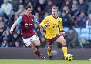 Aston Villa v Arsenal 2010-11 Gallery: Jack Wilshere (Arsenal) Ciaran Clark (Villa). Aston Villa 2: 4 Arsenal. Barclays Premier League