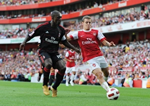 Arsenal v AC Milan 2010-11 Collection: Jack Wilshere (Arsenal) Clarence Seedorf (Milan). Arsenal 1: 1 AC Milan