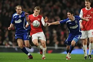 Images Dated 25th January 2011: Jack Wilshere (Arsenal) Colin Healy and Mark Kennedy (Ipswich). Arsenal 3