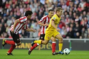 Sunderland v Arsenal 2010-11 Collection: Jack WIlshere (Arsenal) Cristian Riveros and Steed Malbranque (Sunderland)