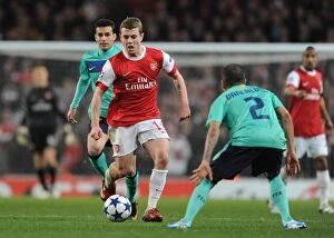 Images Dated 16th February 2011: Jack Wilshere (Arsenal) Daniel Alves (Barcelona). Arsenal 2: 1 Barcelona