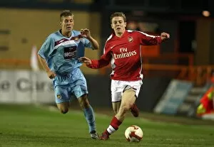 Images Dated 9th March 2009: Jack Wilshere (Arsenal) Daniel Kearns (West Ham)