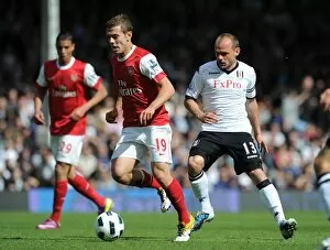 Fulham v Arsenal 2010-11 Collection: Jack Wilshere (Arsenal) Danny Murphy (Fulham). Fulham 2: 2 Arsenal, Barclays Premier League