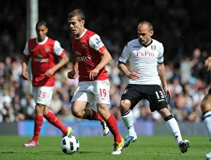 Images Dated 22nd May 2011: Jack Wilshere (Arsenal) Danny Murphy (Fulham). Fulham 2: 2 Arsenal, Barclays Premier League