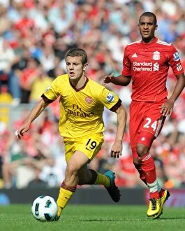 Images Dated 15th August 2010: Jack Wilshere (Arsenal) David Ngog (Liverpool). Liverpool 1: 1 Arsenal, Barclays Premier League