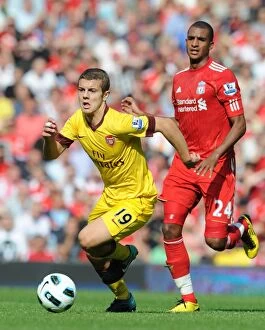 Images Dated 15th August 2010: Jack Wilshere (Arsenal) David Ngog (Liverpool). Liverpool 1: 1 Arsenal, Barclays Premier League