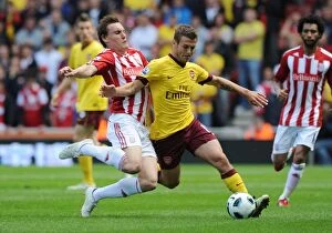 Images Dated 8th May 2011: Jack Wilshere (Arsenal) Dean Whitehead (Stoke). Stoke City 3: 1 Arsenal