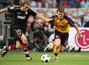 Images Dated 9th August 2008: Jack Wilshere (Arsenal) Diego Trinidad (Seville)
