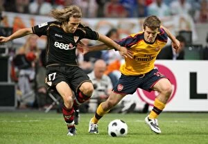 Images Dated 9th August 2008: Jack Wilshere (Arsenal) Diego Trinidad (Seville)