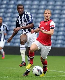 Images Dated 1st October 2012: Jack Wilshere (Arsenal) Donervon Daniels (WBA). West Bromwich Albion U21 1: 0 Arsenal U21