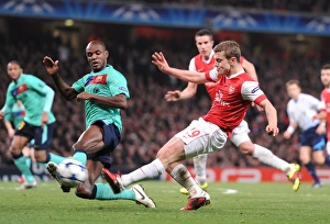 Images Dated 16th February 2011: Jack Wilshere (Arsenal) Eric Abidal (Barcelona). Arsenal 2: 1 Barcelona