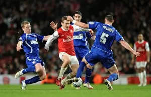 Images Dated 25th January 2011: Jack Wilshere (Arsenal) Grant Leadbitter and Damien Delaney (Ipswich). Arsenal 3