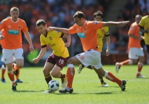 Images Dated 10th April 2011: Jack Wilshere (Arsenal) Ian Evatt (Blackpool). Blackpool 1: 3 Arsenal, Barclays Premier League