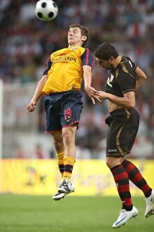Images Dated 9th August 2008: Jack Wilshere (Arsenal) Ivica Dragutinovic (Seville)